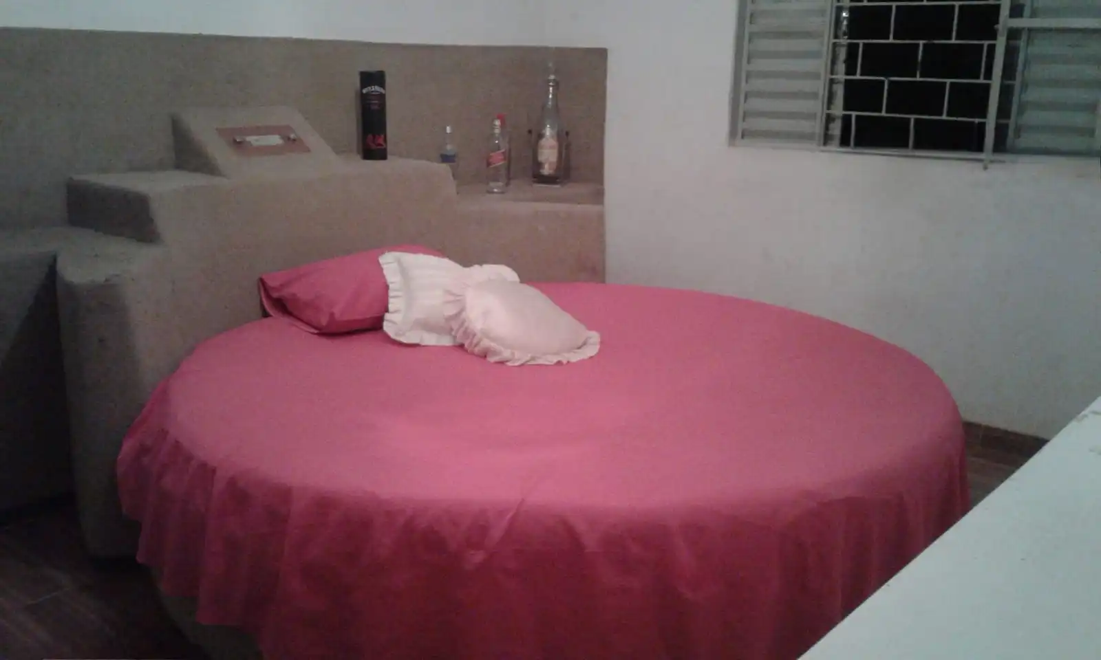 Quarto com cama redonda